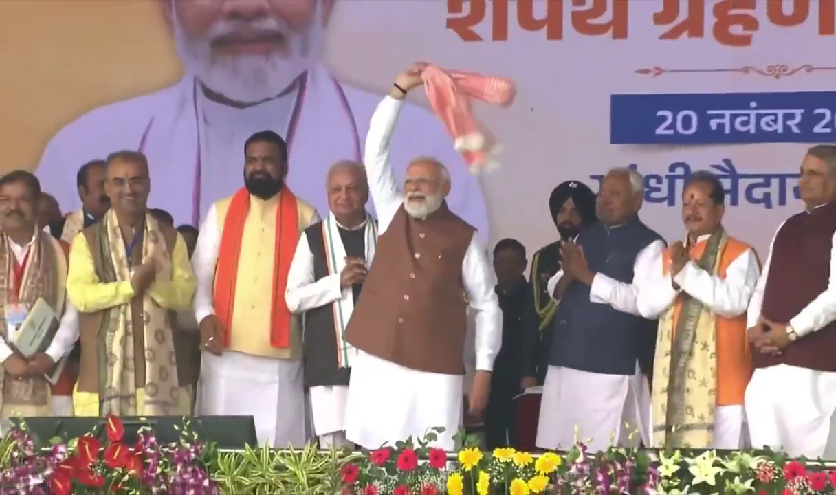 PM NARENDRA MODI WAVES TOWEL